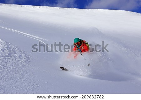 An expert skier skiing in the Utah mountains, USA.