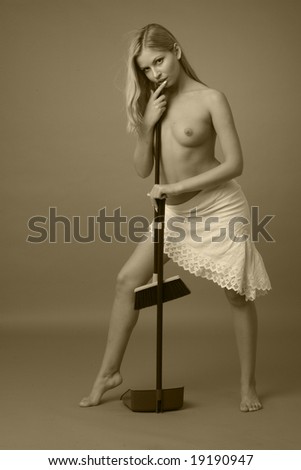 stock photo beautiful bare girl with a scoop and broom