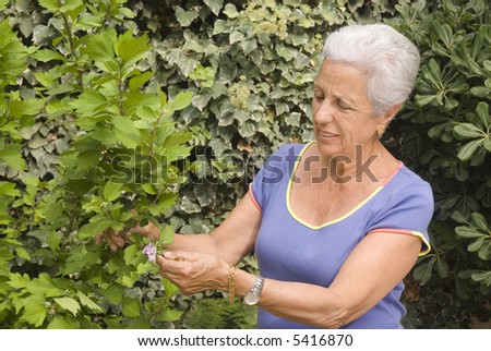 senior lady looking after her plants