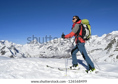 Ascending to the top. Ski mountaineering cross country skiing in Italian Alps, Cervino Matterhorn