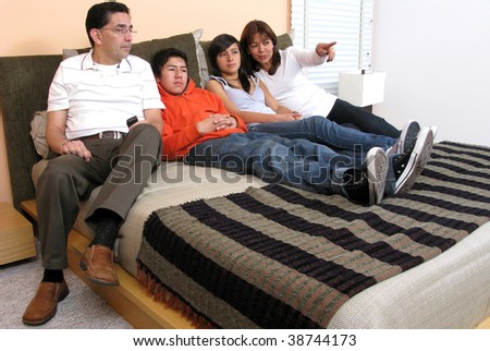 Big family look television indoor bedroom