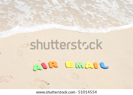 Air-Email text written with plastics letters colours.