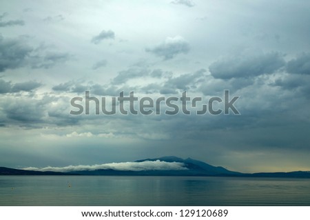 stormy weather over the mountains and the  sea