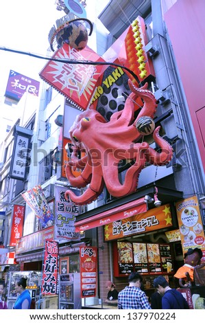 OSAKA - OCT 23: Dotonbori on October 23, 2012 in Osaka, Japan. With a history reaching back to 1612, the districts now one of Osaka's primary tourist destinations featuring several restaurants.