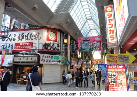OSAKA - OCT 23: Dotonbori on October 23, 2012 in Osaka, Japan. With a history reaching back to 1612, the districts now one of Osaka's primary tourist destinations featuring several restaurants.