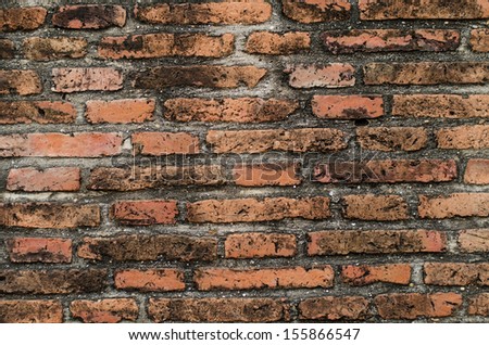 Aged street brick wall texture