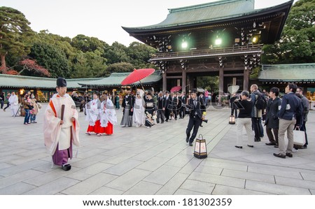 TOKYO,JAPAN-NOV 20 :A Japanese wedding ceremony at Shrine on November 20,2013.As Meiji Jingu Shrine is an active shrine it\'s possible to see wedding parties