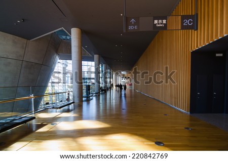 Tokyo, Japan - November 23, 2013: People visit National Art Center in Tokyo, Japan.  The museum has an exhibition of 600 pieces, concentrating on 20th-century painting and modern arts.