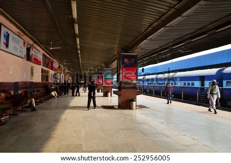 Jaipur, India - January 3, 2015: Passenger on platforms at the railway station of Jaipur, Rajasthan, India. Indian Railways carries about 7,500 million passengers annually.
