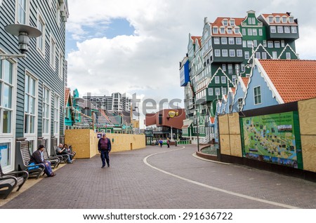 Zaandam, Netherlands - May 5, 2015: People walk on a pedestrian zone in Zaandam, Netherlands. Zaandam was a leading city in the first Industrial Revolution. Into the second half of the 20th century.