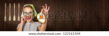 Happy funny woman cook with fried egg - web banner crop concept