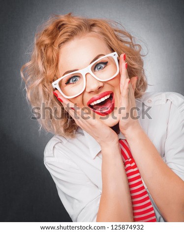 Smile face of young blond woman. Joyful surprised girl