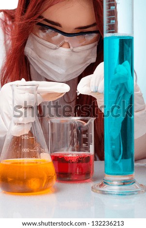 Chemist woman with test tubes