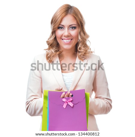 Happy smile blond woman with shopping bags, isolated on white background. Waist up studio shot