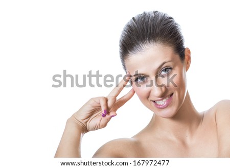 Expressive sexy girl biting her lips and showing her fingers, isolated on white background - studio shot. Female or girl with clean fresh skin