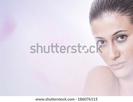 Calm softly portrait of a beauty woman with copyspace for your text. Young female with healthy fresh skin, skincare concept. Head and shoulders portrait