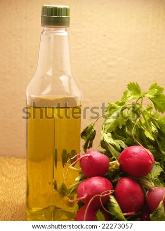 oil and radishes, photograph in first plane