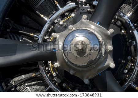 Close up of radial aircraft engine in bright sunlight.