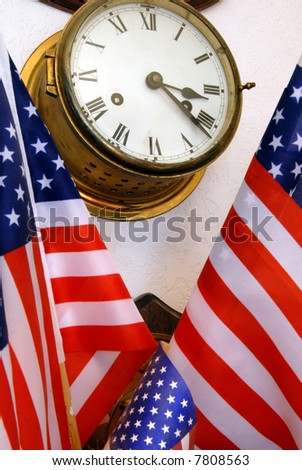 Aged Nautical Ship's Clock and American Flags in Household Setting