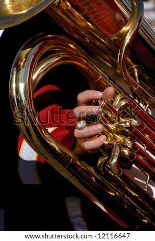 Youthful High School Marching Band Member with Aged Brass Euphonium in Hand