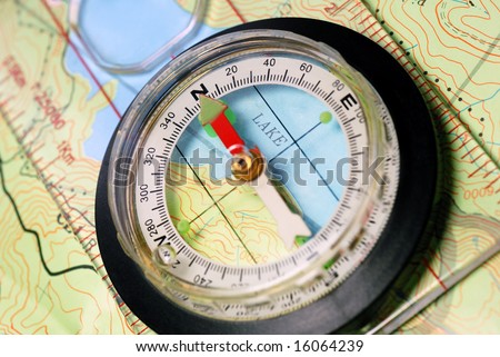 Transparent Navigational Compass on Topographical Map, Needle Pointing Dead North