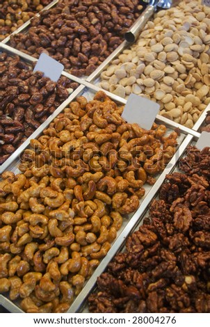 Nuts and candles at La Boqueria Market in Barcelona, Spain