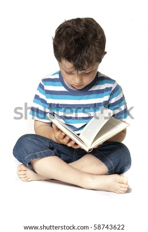 Lovely child reading a book