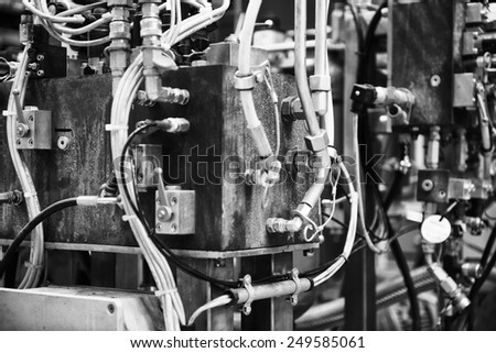 Black and White image of machine part on factory