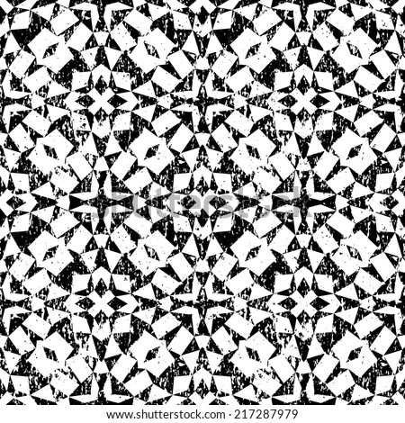 Grunge seamless geometric pattern in modern hipster style with small triangles and abstract stars in black and white. Vector background with used old scratched texture.