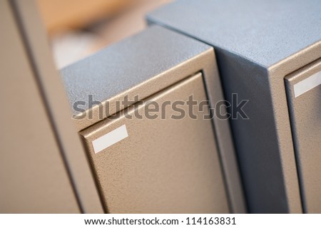closeup of metal cabinet with blank name tag