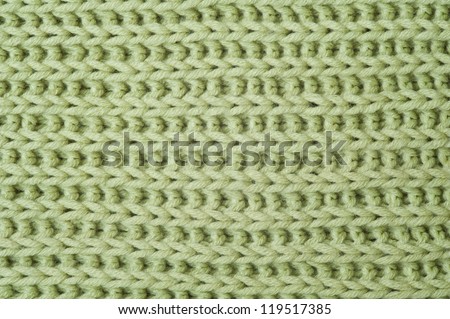 closeup of green knitted fabric texture