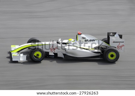 SEPANG, MALAYSIA - APRIL 3 : Brawn GP Formula One driver Jenson Button of Britain drives his car during the first practice session during 2009 Malaysian Formula 1 Grand Prix April 3, 2009 in Sepang.