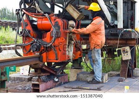 Railway workers were Welding with Flash Butt Welding Machine