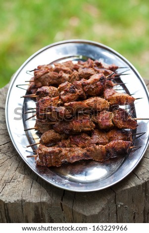 An image of grilled meat on plate
