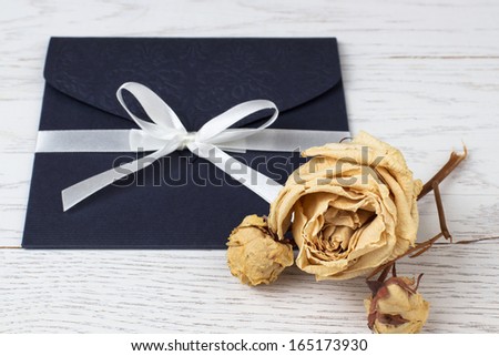 Image of an elegant envelope on the table.