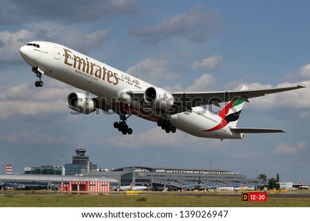 Prague, Czech Republic - June 28: Emirates Boeing 777-31h Takes Off From Prg Airport On June 28, 2012. Emirates Is Rated As A Top 10 Best Airlines In The World Flying On Youngest Fleet.