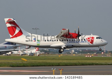 PRAGUE, CZECH REPUBLIC - JUNE 19: CSA Czech Airlines ATR42-500 lands at PRG on June 19,2013. Airplane with new company logo, symbolizing the 90 years CSA hiostory. Company was founded in 1923.