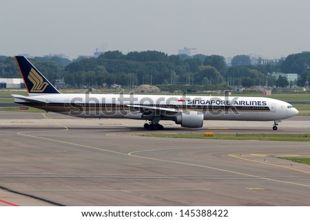AMSTERDAM - JULY 05: Singapore Airlines Boeing 777 taxis at AMS Airport on July 05,2012. Company is the flag carrier of Singapore. Singapore Airlines operates a hub at Changi Airport.
