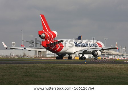 PARIS, FRANCE - MARCH 29: Martinair Cargo McDonnell Douglas MD-11F taxis around CDG Airport on March 29, 2010. Martinair Cargo operates cargo services to over 50 destinations worldwide