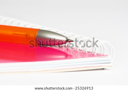 Notebook and pen isolated on the white