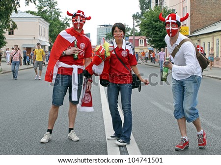 KHARKIV, UKRAINE - JUNE 9: Denmark fans at Kharkov streets before UEFA EURO 2012 Netherlands vs. Denmark football match, June 9, 2012 in Kharkiv, Ukraine