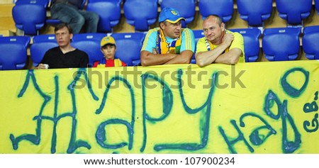 KHARKIV, UKRAINE - JULY 14: FC Metalist (Kharkiv) fans deployed banner during football match vs. FC Illichivets (Mariupol) (2:0), July 14, 2012 in Kharkov, Ukraine