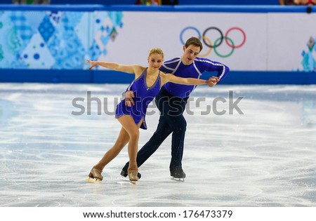 Sochi, RUSSIA - February 11, 2014: Julia LAVRENTIEVA and Yuri RUDYK (UKR) on ice during figure skating competition of pairs in short program at Sochi 2014 XXII Olympic Winter Games