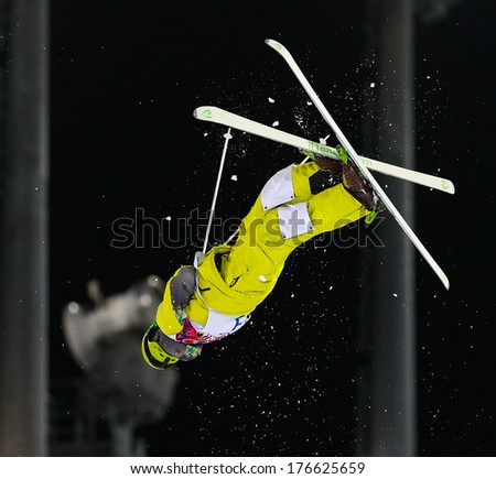 SOCHI, RUSSIA - FEB 10, 2014: Dmitriy REIHERD (KAZ) at Men\'s Moguls Final of Freestyle skiing at Sochi 2014 XXII Olympic Winter Games