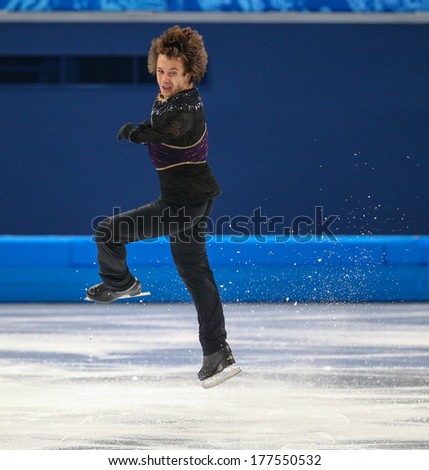 Sochi, RUSSIA - February 14, 2014: Alexei BYCHENKO (ISR) on ice during figure skating competition of men free skating at Sochi 2014 XXII Olympic Winter Games