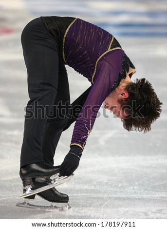 Sochi, RUSSIA - February 14, 2014: Alexei BYCHENKO (ISR) on ice during figure skating competition of men free skating at Sochi 2014 XXII Olympic Winter Games