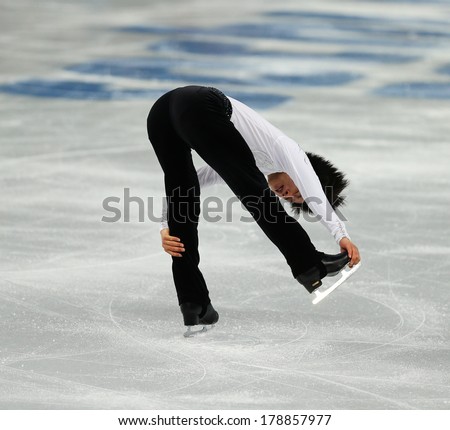 Sochi, RUSSIA - February 13, 2014: Tatsuki MACHIDA (JPN) on ice during figure skating competition of men in short program at Sochi 2014 XXII Olympic Winter Games