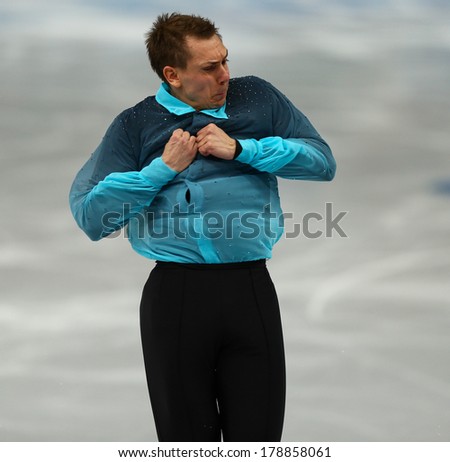 Sochi, RUSSIA - February 13, 2014: Peter LIEBERS (GER) on ice during figure skating competition of men in short program at Sochi 2014 XXII Olympic Winter Games