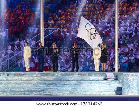 Sochi, RUSSIA - February 23, 2014: Olympic flag passing at closing ceremony in Fisht Olympic Stadium at the Sochi 2014 Olympic Games