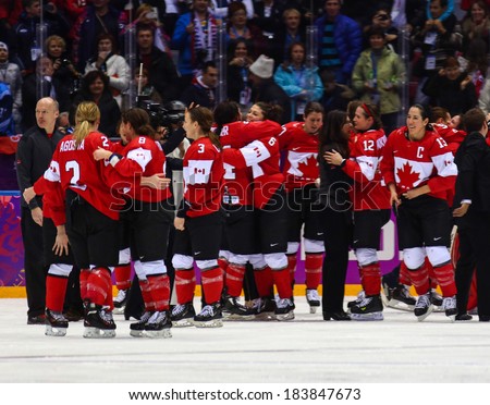 Sochi, RUSSIA - February 20, 2014: Canadian Women\'s Ice hockey team celebrating gold medals, after Gold Medal Game vs. USA team at the Sochi 2014 Olympic Games